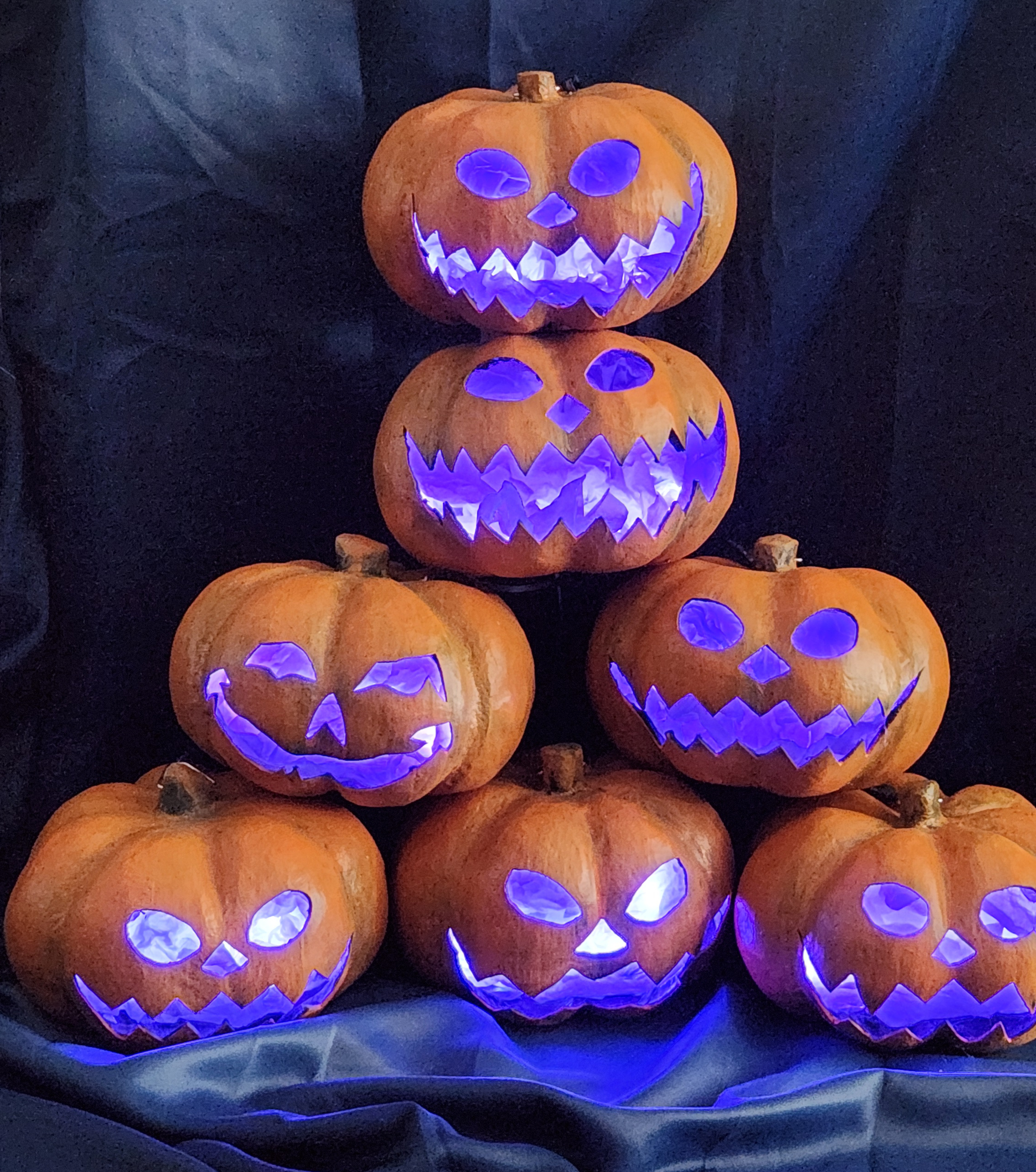 Paper jack-o-lanterns with RGBW led lighting. Shown in Purple.